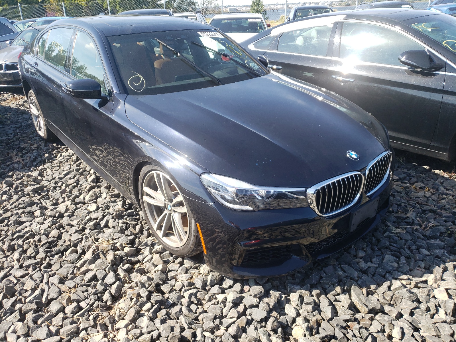 BMW 740 XI 2019 with VIN WBA7E4C55KGV69982 - Photo from auction