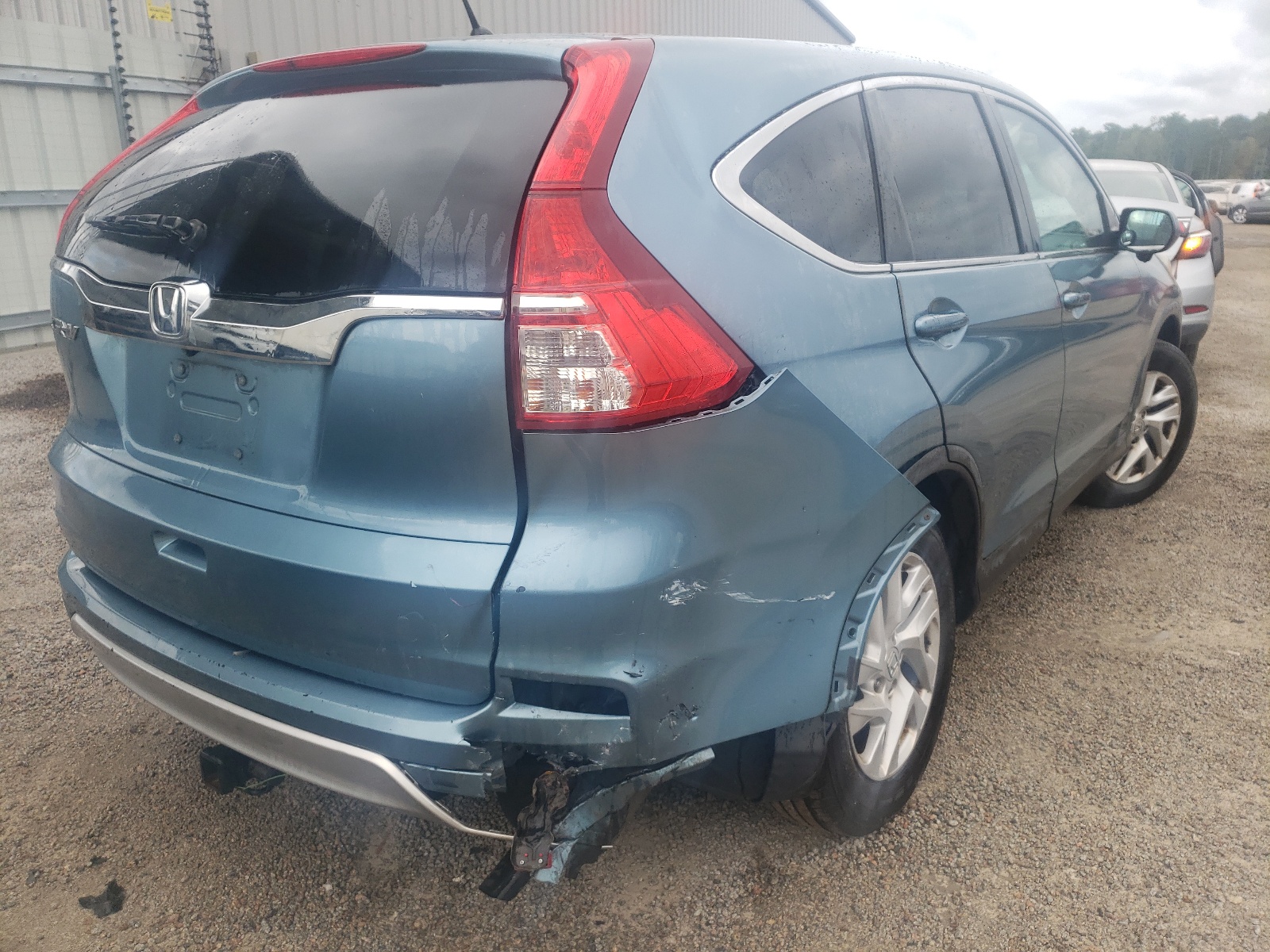 Photo 4 from auction – 2015 HONDA CR-V EX with VIN 2HKRM3H59FH524725
