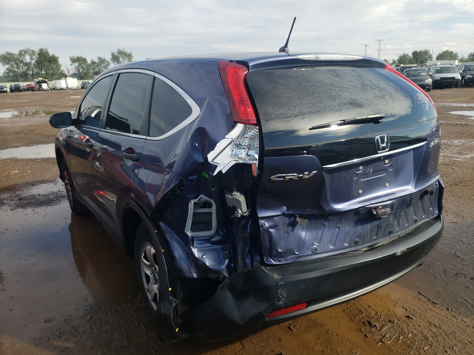 Photo 3 from auction – 2014 HONDA CR-V LX with VIN 2HKRM4H36EH696293