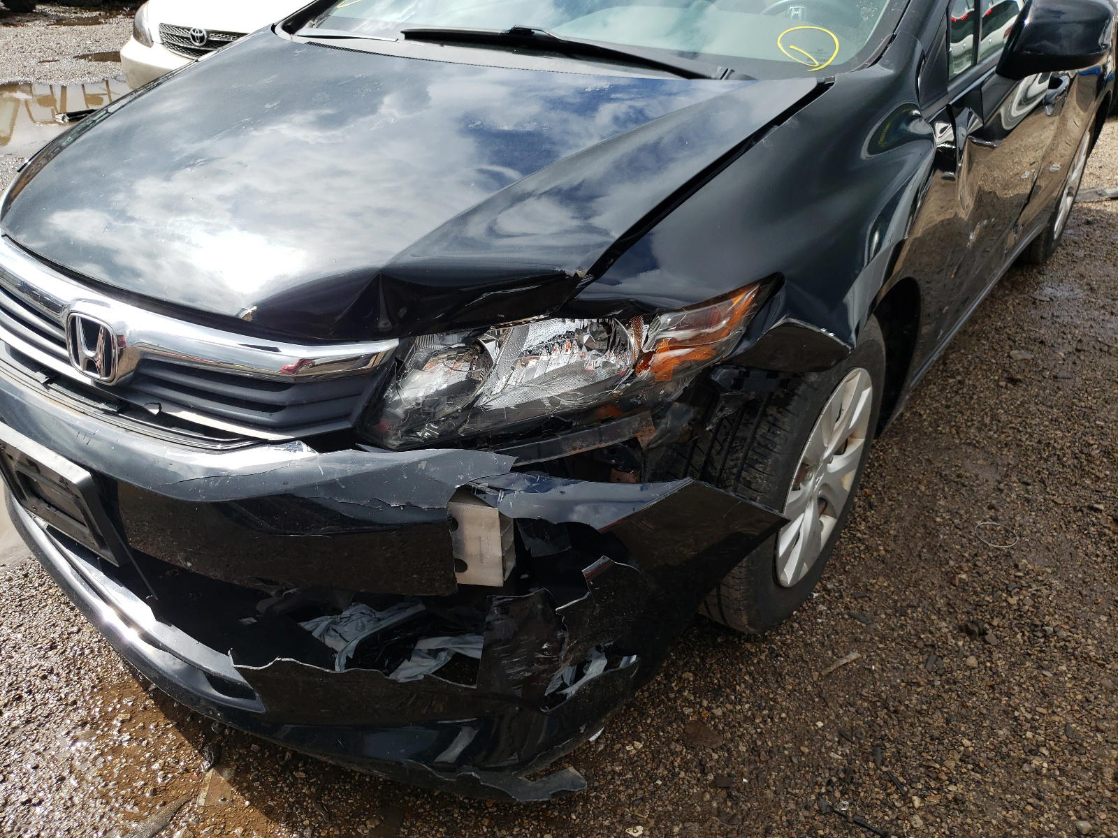 Photo 9 from auction – 2012 HONDA CIVIC LX with VIN 19XFB2F51CE056883