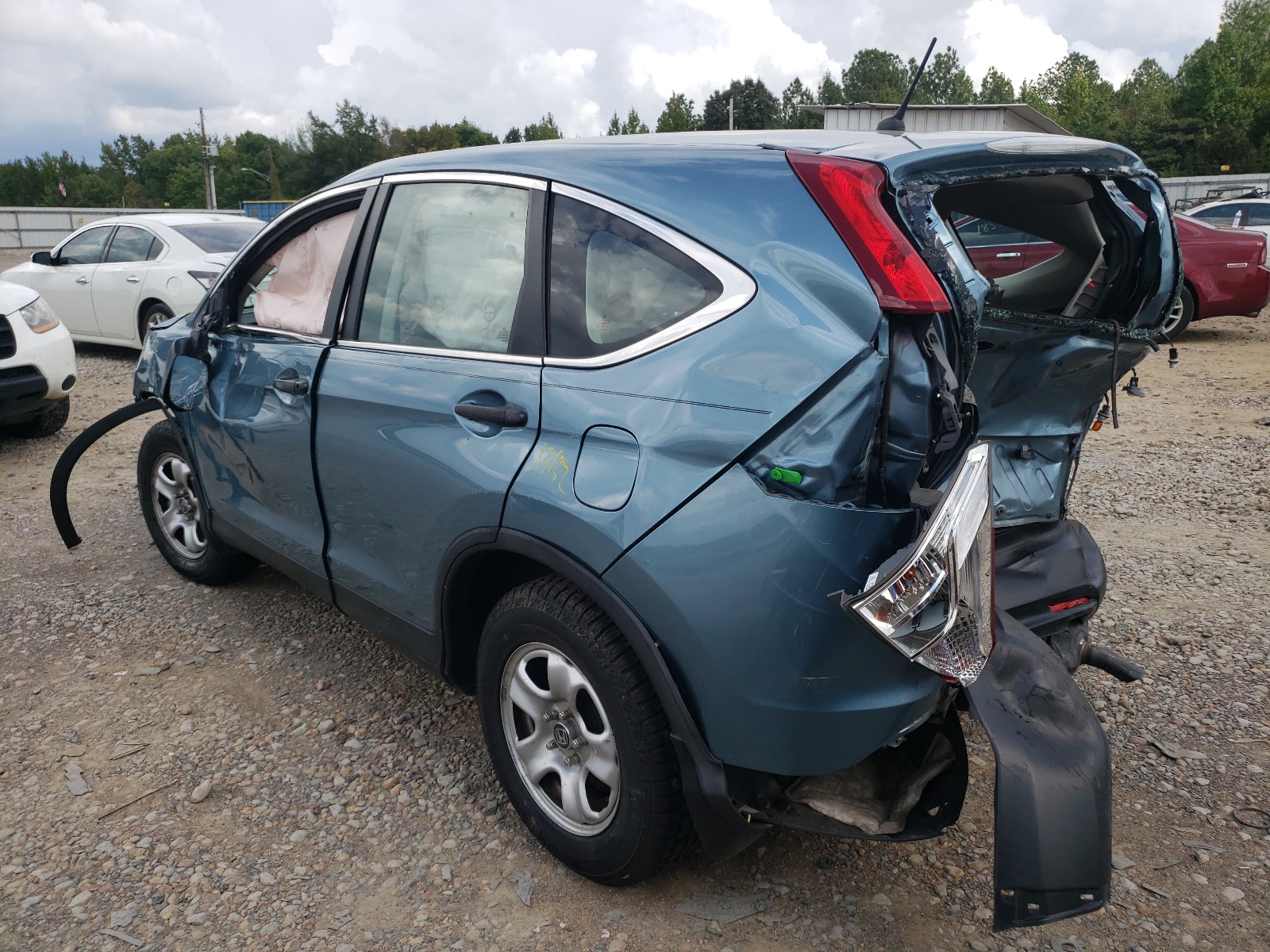 Photo 3 from auction – 2014 HONDA CR-V LX with VIN 2HKRM3H39EH508246
