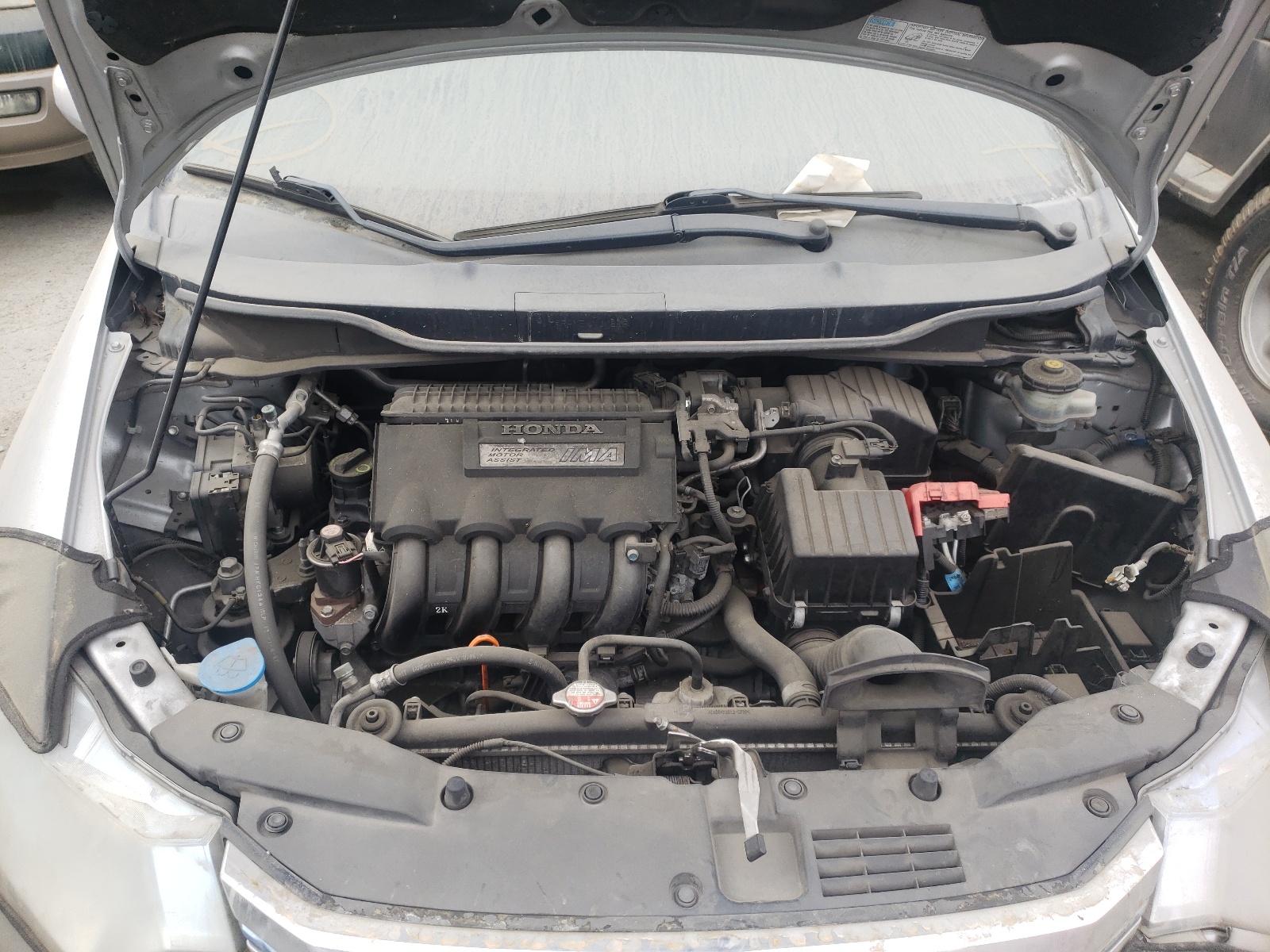 Photo 7 from auction – 2012 HONDA INSIGHT LX with VIN JHMZE2H59CS000722