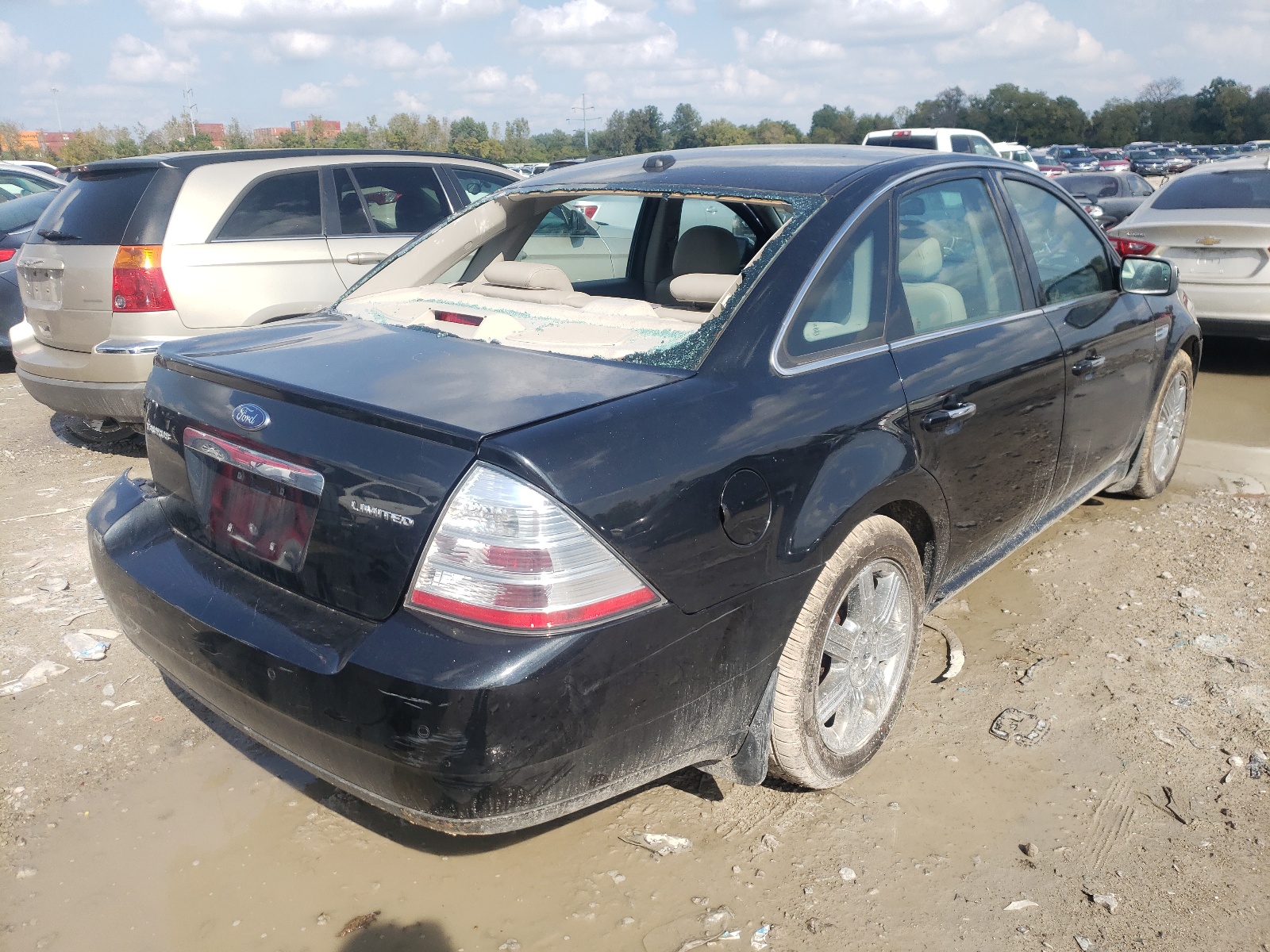 Photo 4 from auction – 2009 FORD TAURUS LIM with VIN 1FAHP25W39G114527