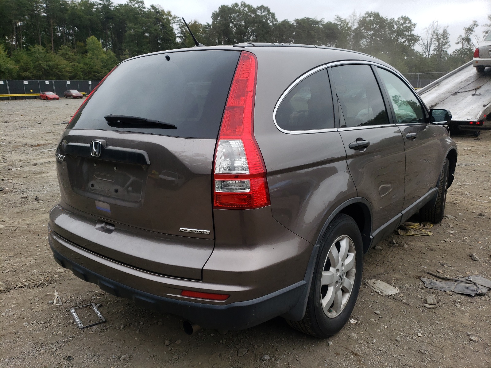 Photo 4 from auction – 2011 HONDA CR-V SE with VIN 5J6RE3H45BL010844