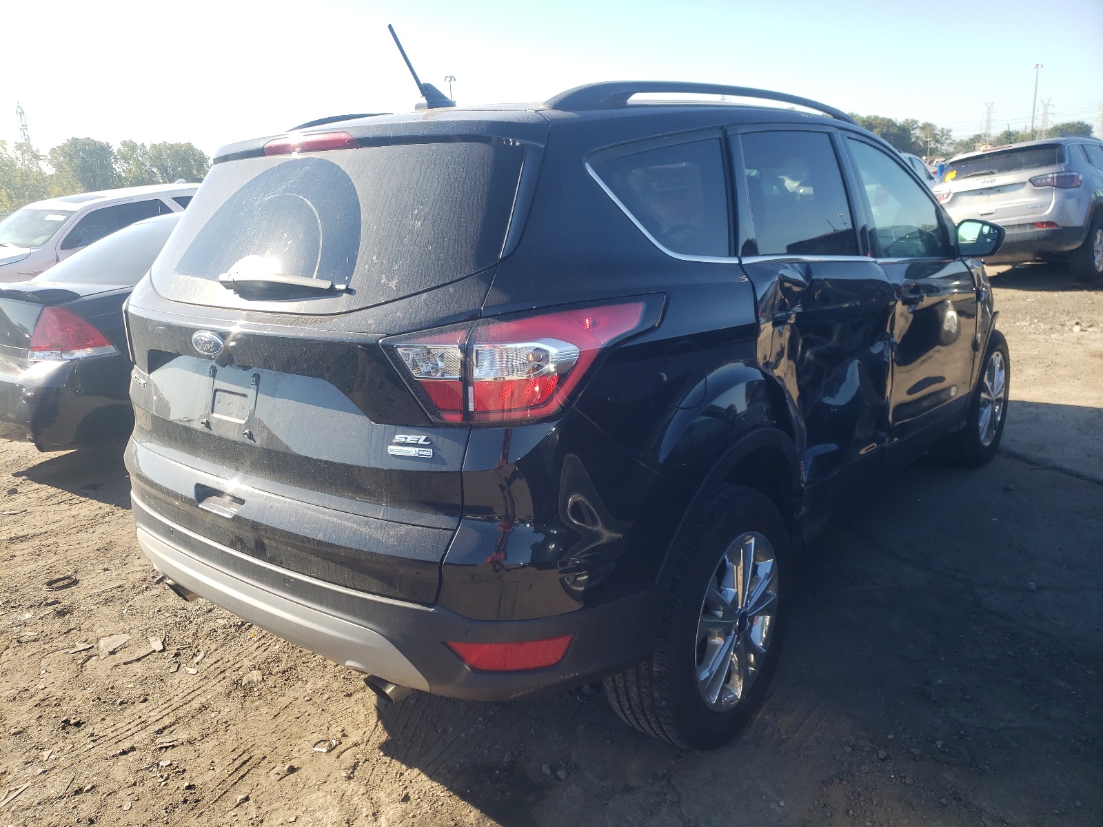 Photo 4 from auction – 2018 FORD ESCAPE SEL with VIN 1FMCU9HD5JUA90166