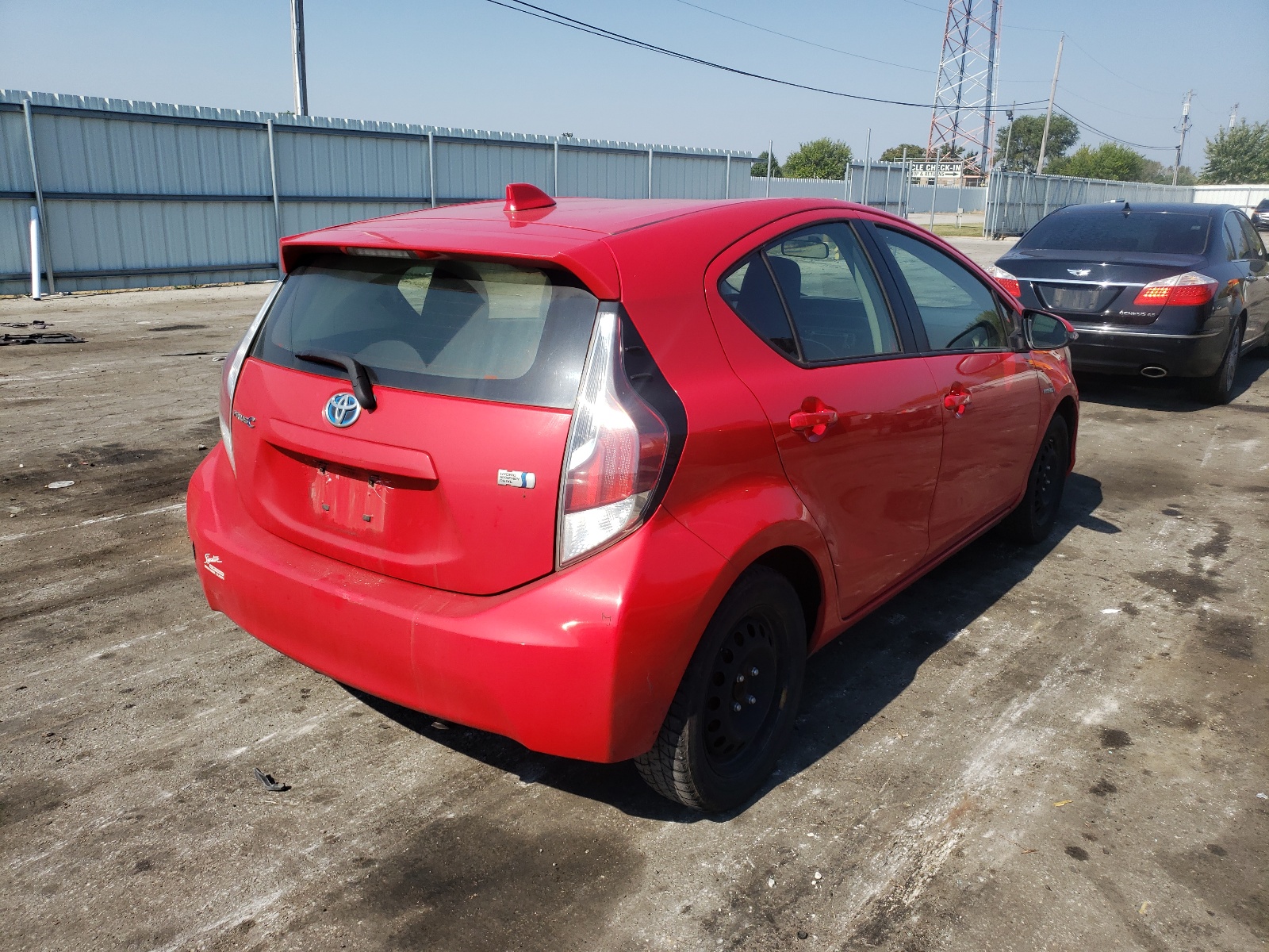 Photo 4 from auction – 2015 TOYOTA PRIUS C with VIN JTDKDTB35F1586056
