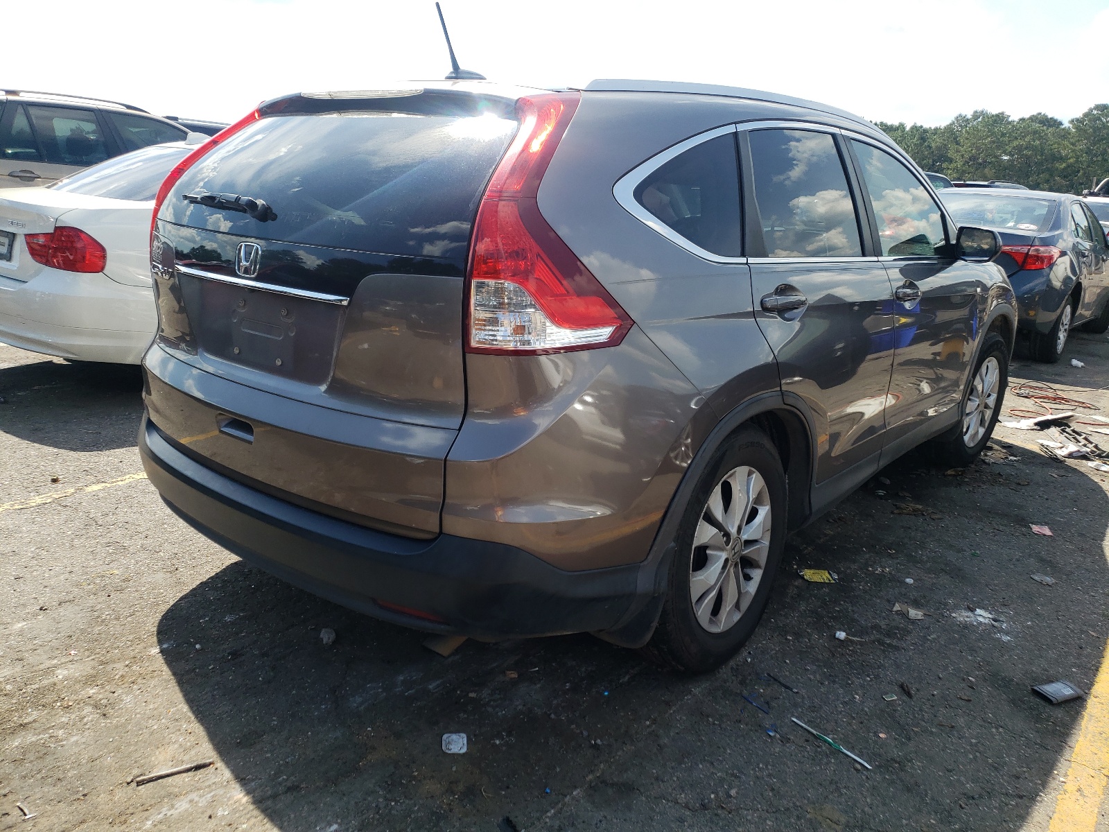 Photo 4 from auction – 2012 HONDA CR-V EXL with VIN 5J6RM3H74CL031148