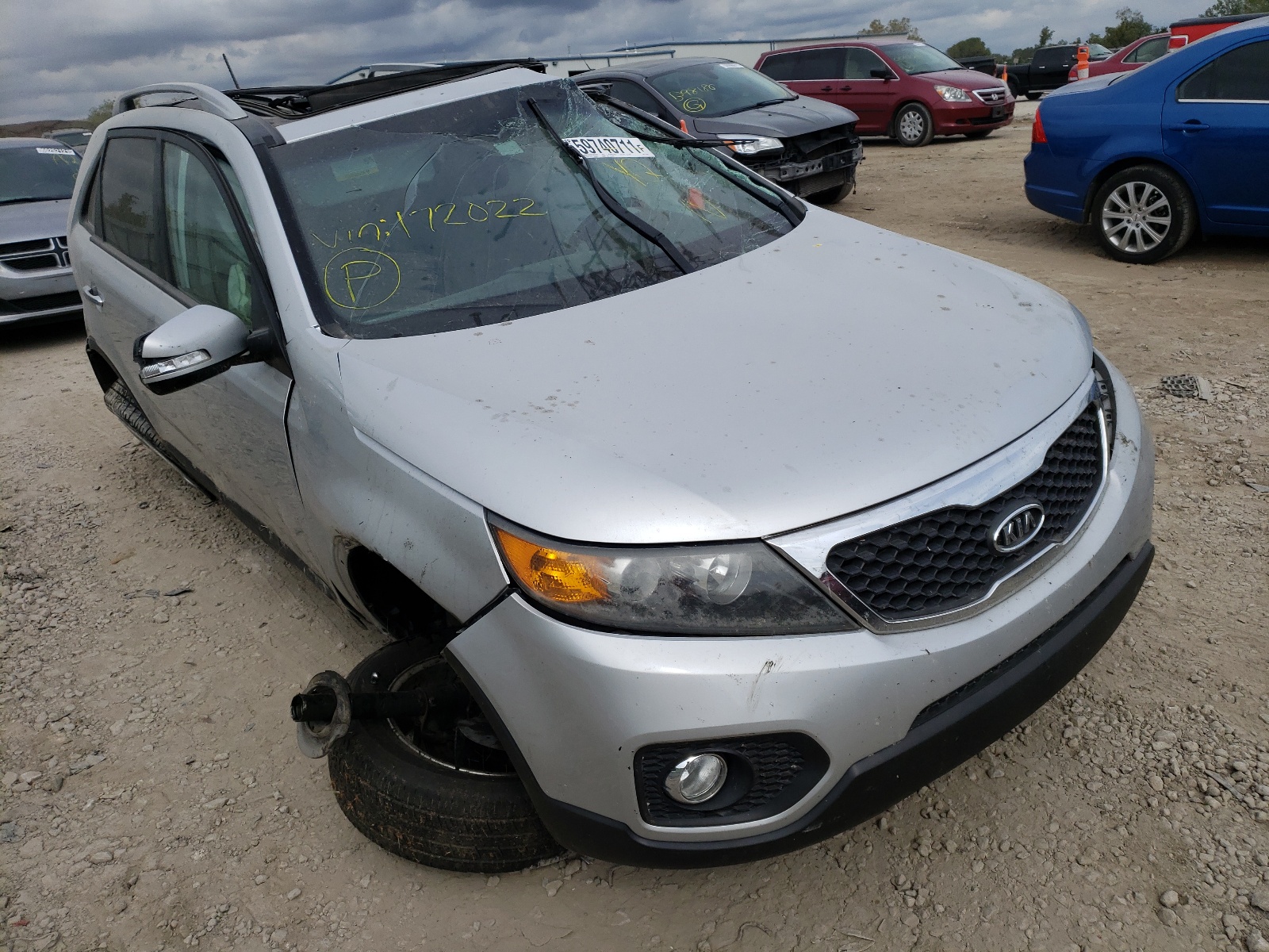 KIA SORENTO EX 2011 with VIN 5XYKU4A2XBG172022 - Photo from auction