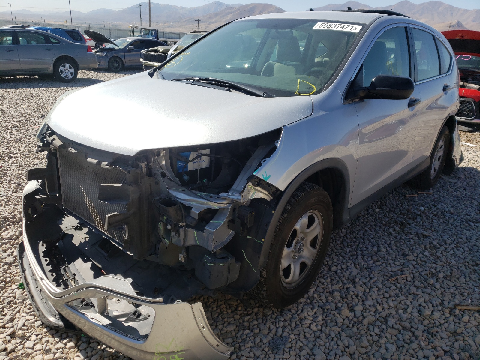 Photo 2 from auction – 2015 HONDA CR-V LX with VIN 3CZRM3H33FG703988