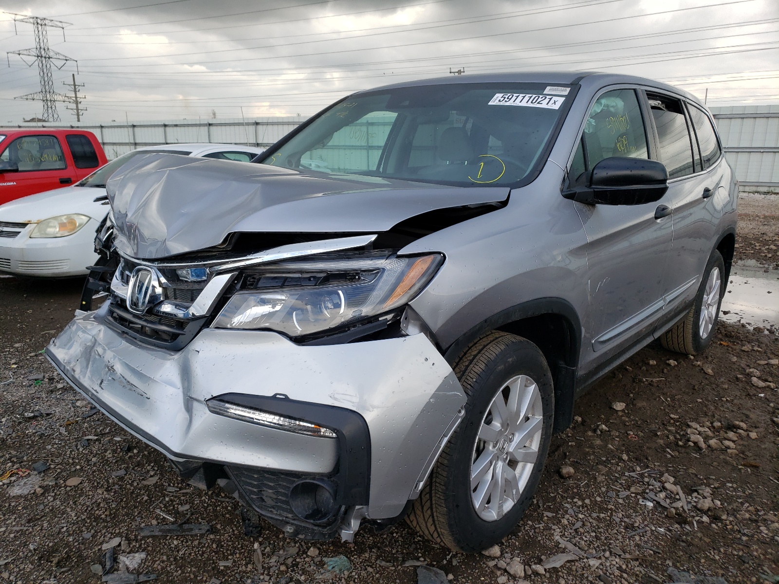 Photo 2 from auction – 2019 HONDA PILOT LX with VIN 5FNYF6H13KB079329
