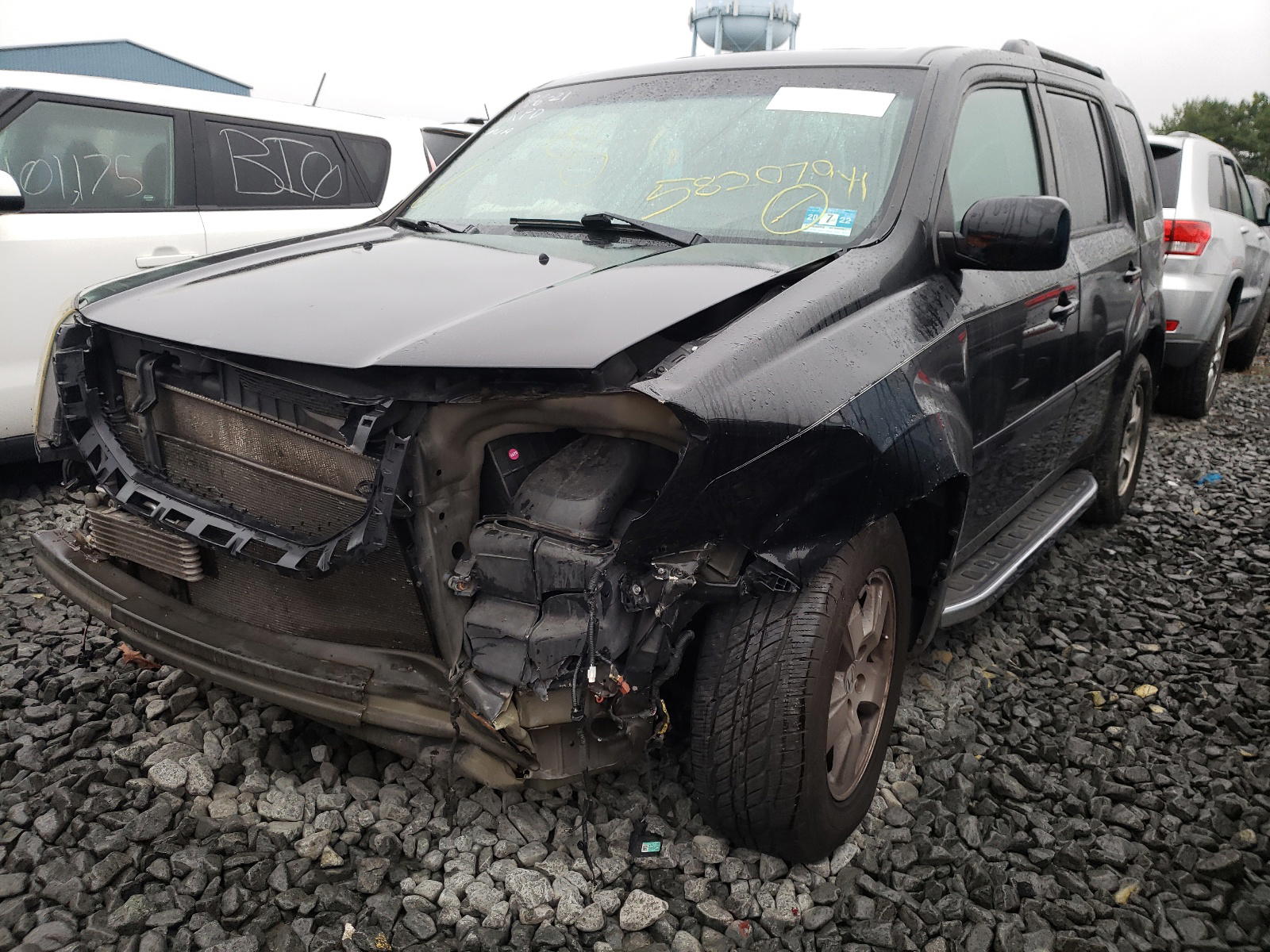 Photo 2 from auction – 2011 HONDA PILOT with VIN 5FNYF4H66BB096349