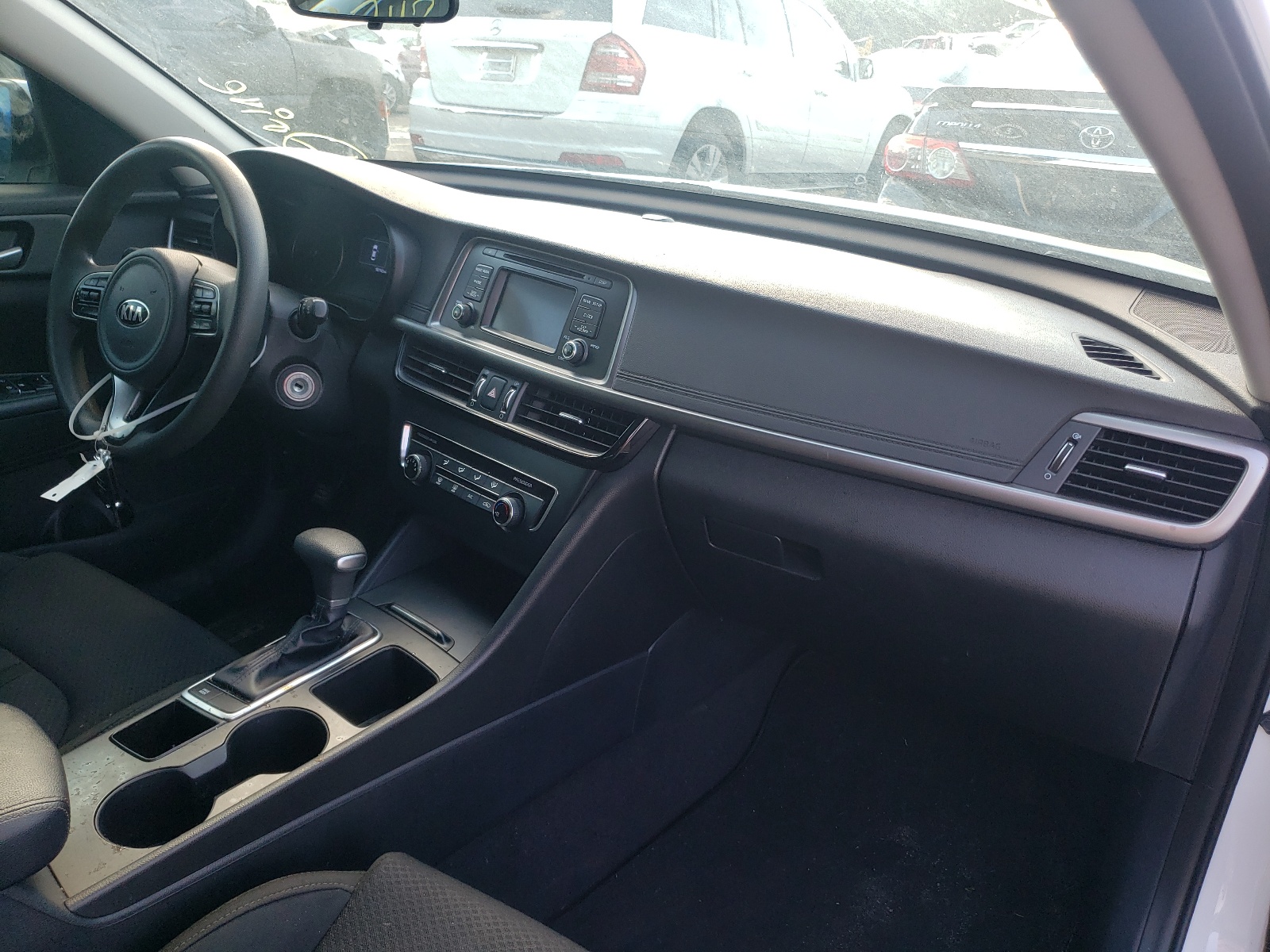 Photo 9 from auction – 2016 KIA OPTIMA LX with VIN 5XXGT4L33GG053156