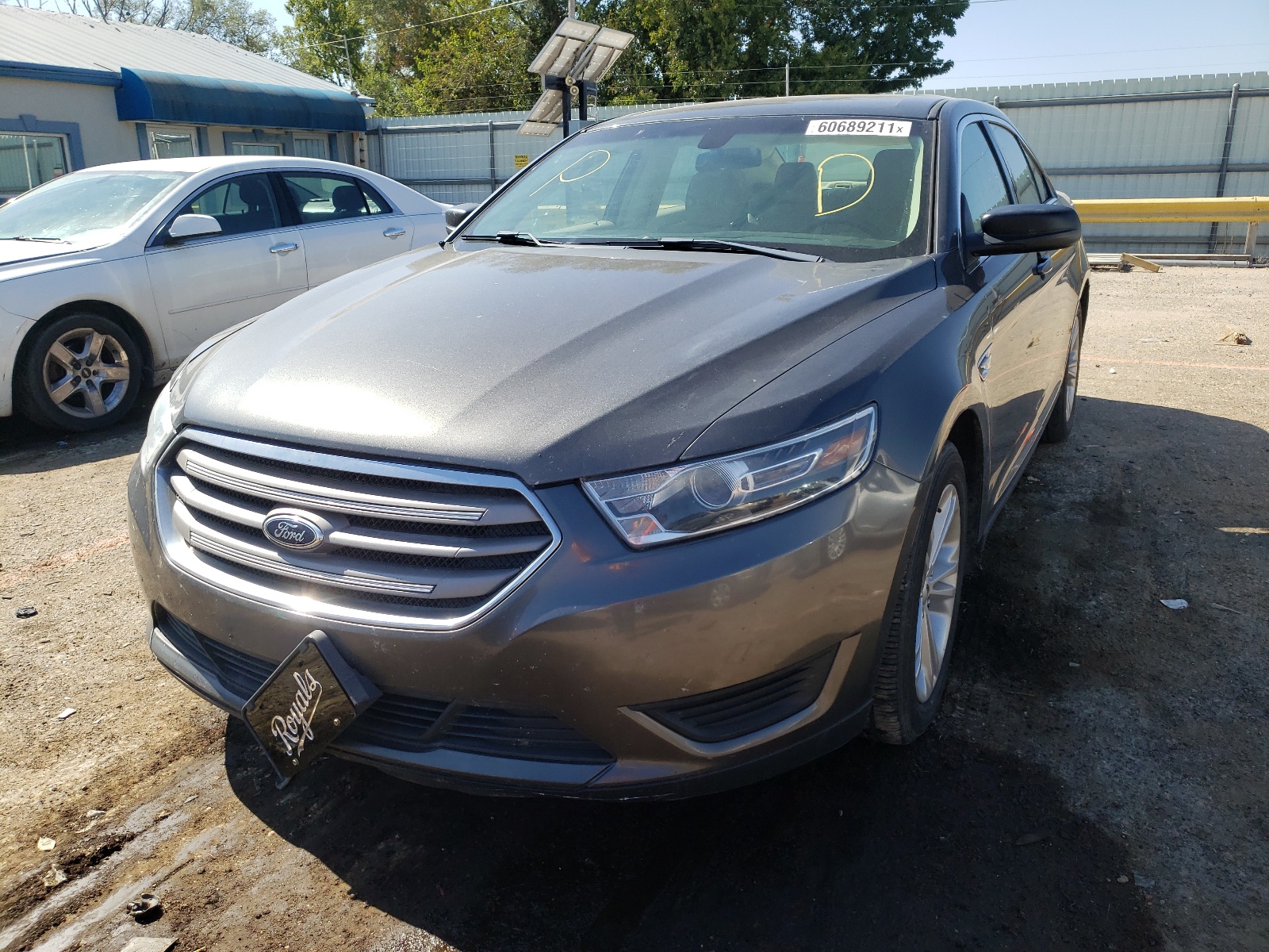 Foto 2 de la subasta – 2015 FORD TAURUS SE con VIN 1FAHP2D88FG141138
