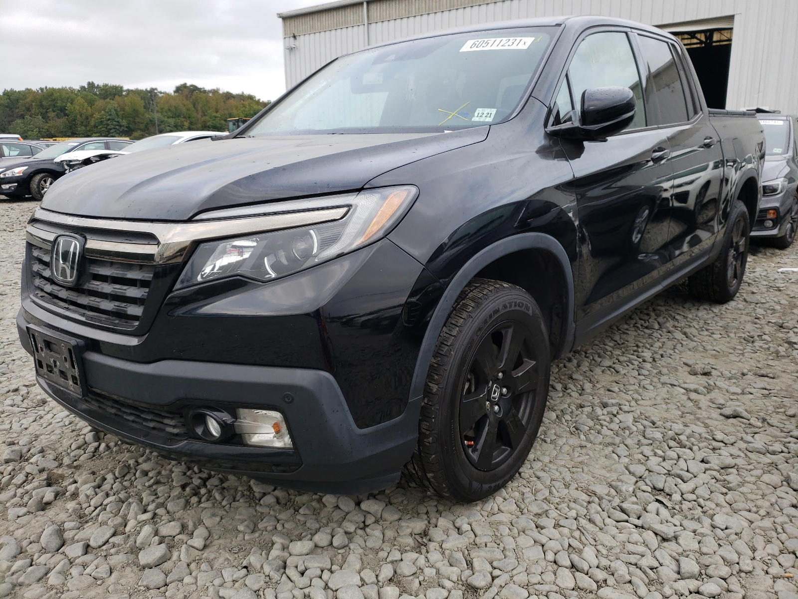 Photo 2 from auction – 2017 HONDA RIDGELINE with VIN 5FPYK3F84HB021482