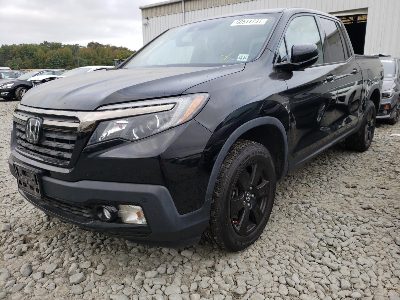 Фото 2 с аукциона – 2017 HONDA RIDGELINE с VIN 5FPYK3F84HB021482