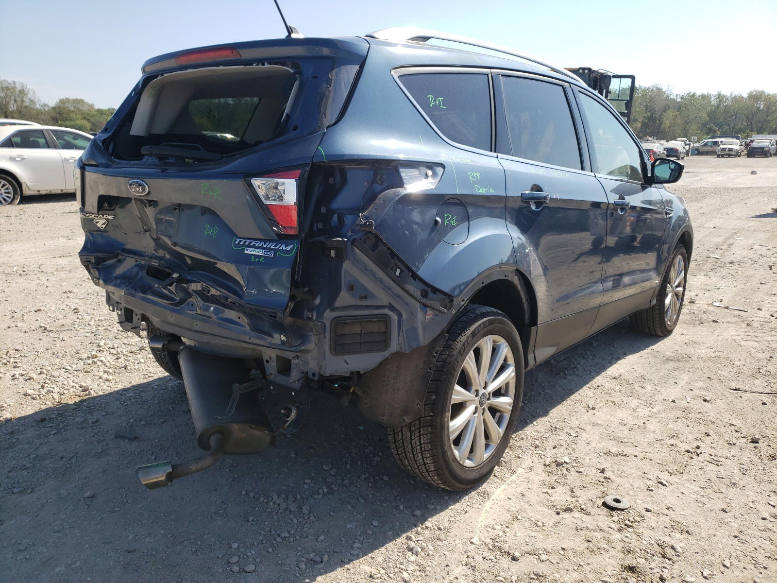 Photo 4 from auction – 2018 FORD ESCAPE TIT with VIN 1FMCU9J98JUB02428