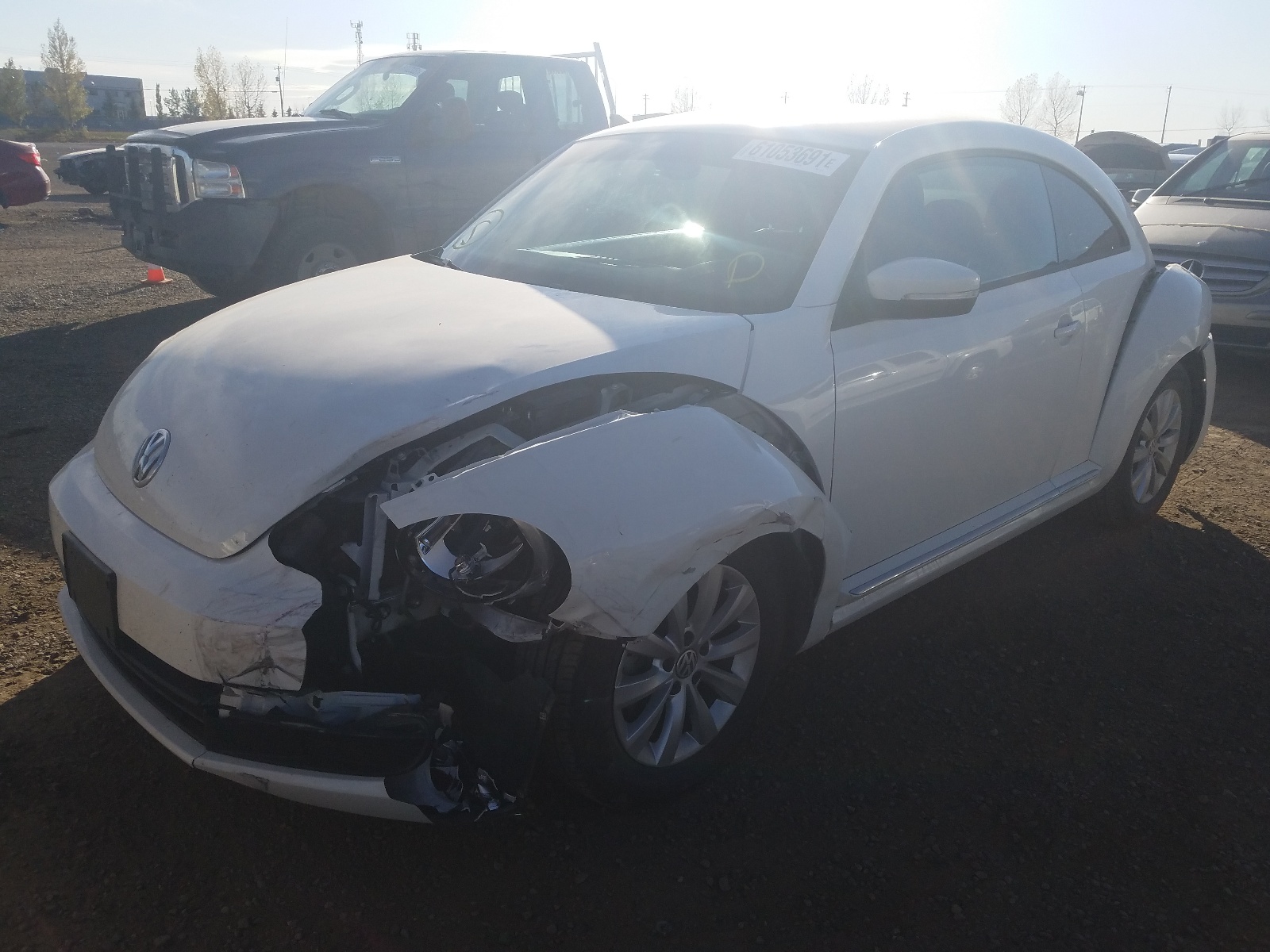 Photo 2 from auction – 2012 VOLKSWAGEN BEETLE with VIN 3VWHX7AT6CM619734