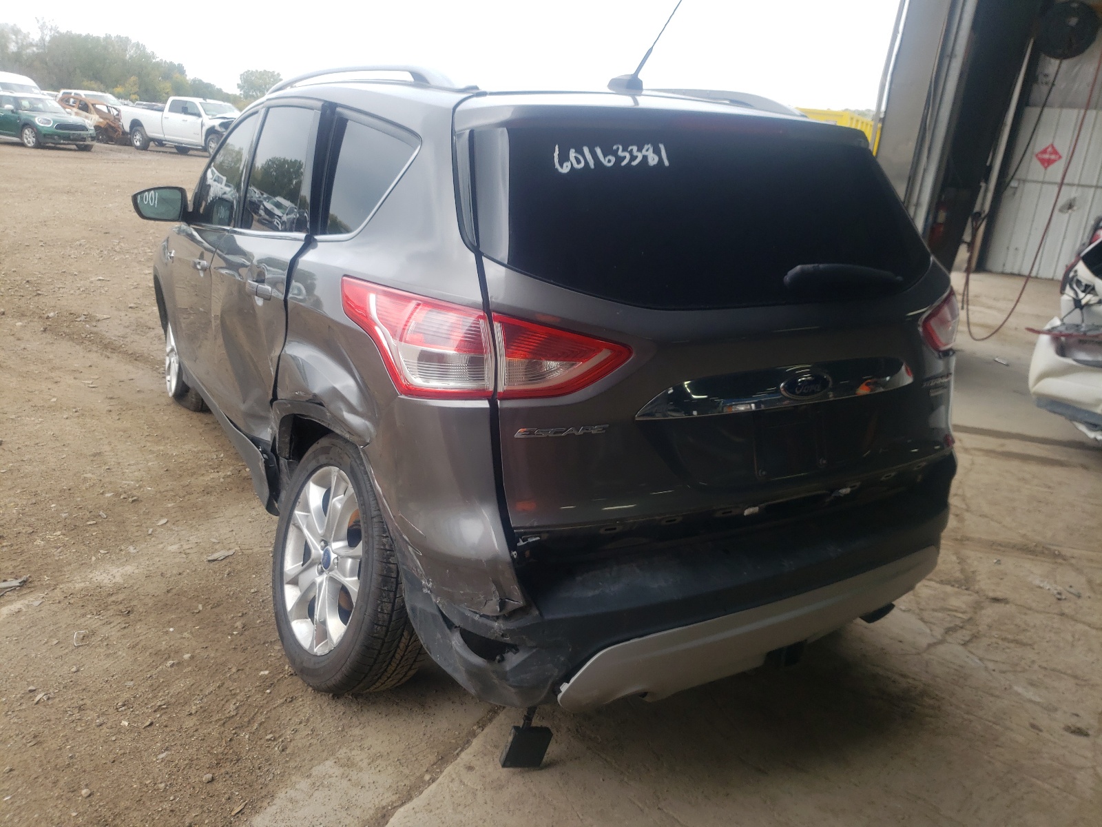 Photo 3 from auction – 2014 FORD ESCAPE TIT with VIN 1FMCU9J98EUA92070