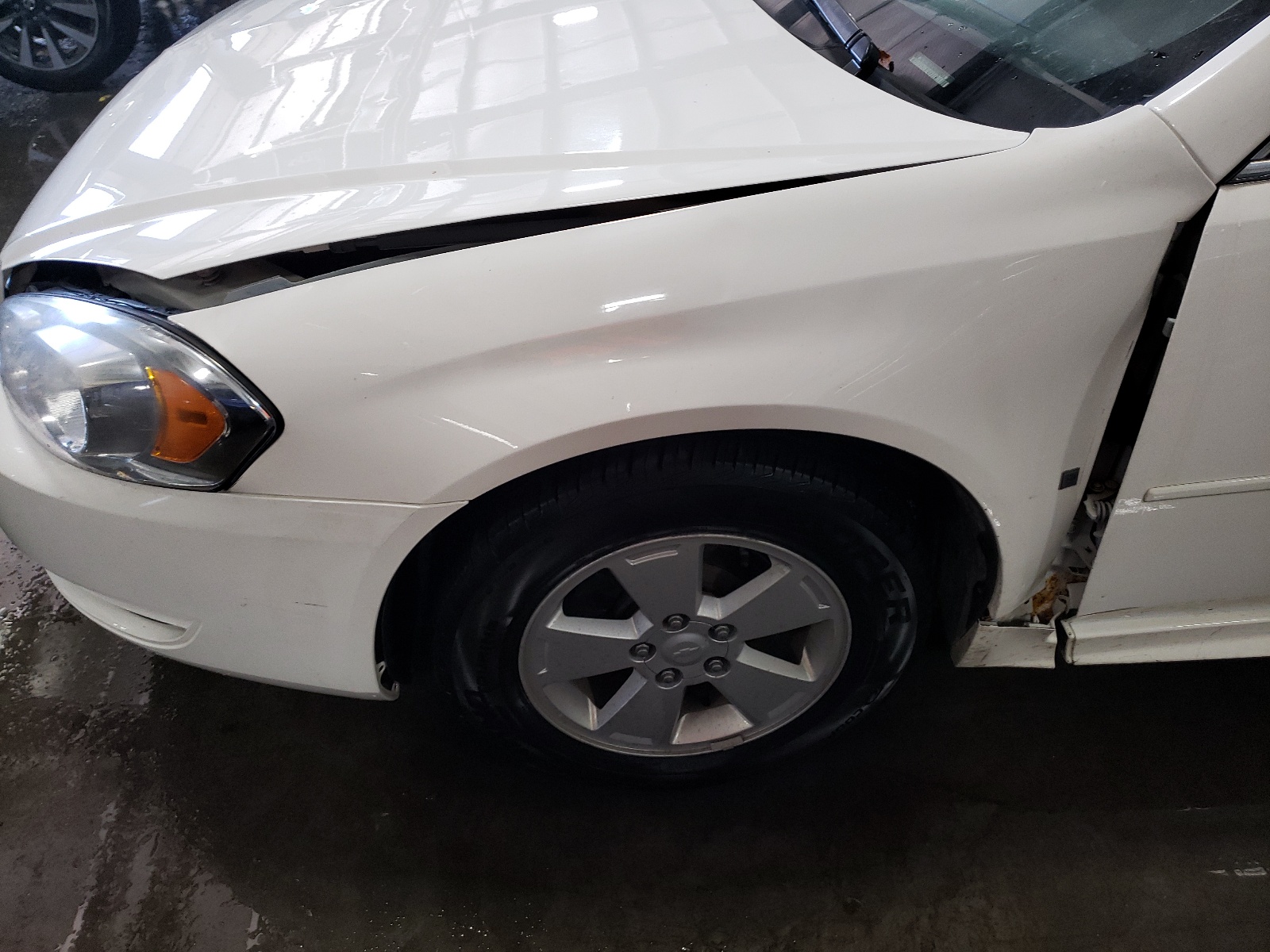 Photo 9 from auction – 2009 CHEVROLET IMPALA 1LT with VIN 2G1WT57KX91243704
