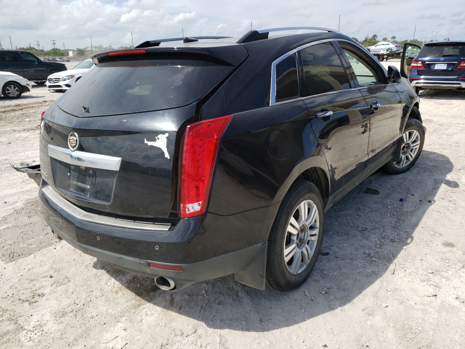 Photo 4 from auction – 2011 CADILLAC SRX LUXURY with VIN 3GYFNAEY5BS587348