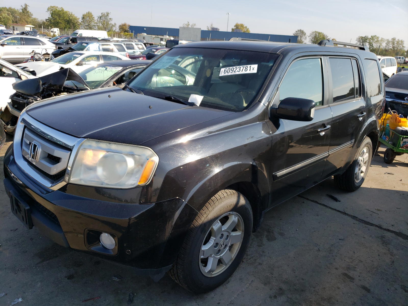 Photo 2 from auction – 2011 HONDA PILOT TOUR with VIN 5FNYF4H96BB501314