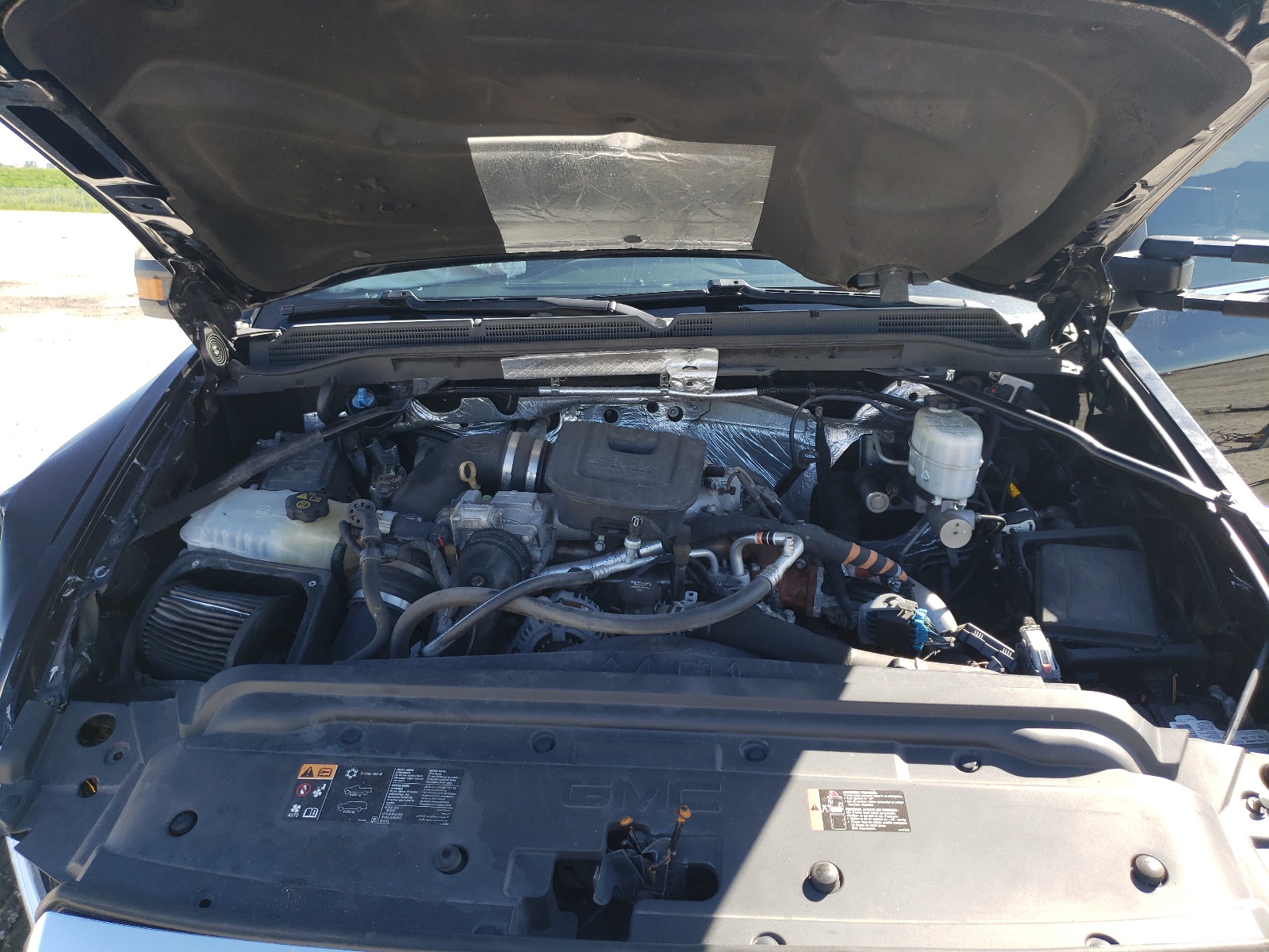 Photo 7 from auction – 2016 GMC SIERRA K25 with VIN 1GT12UE87GF183828