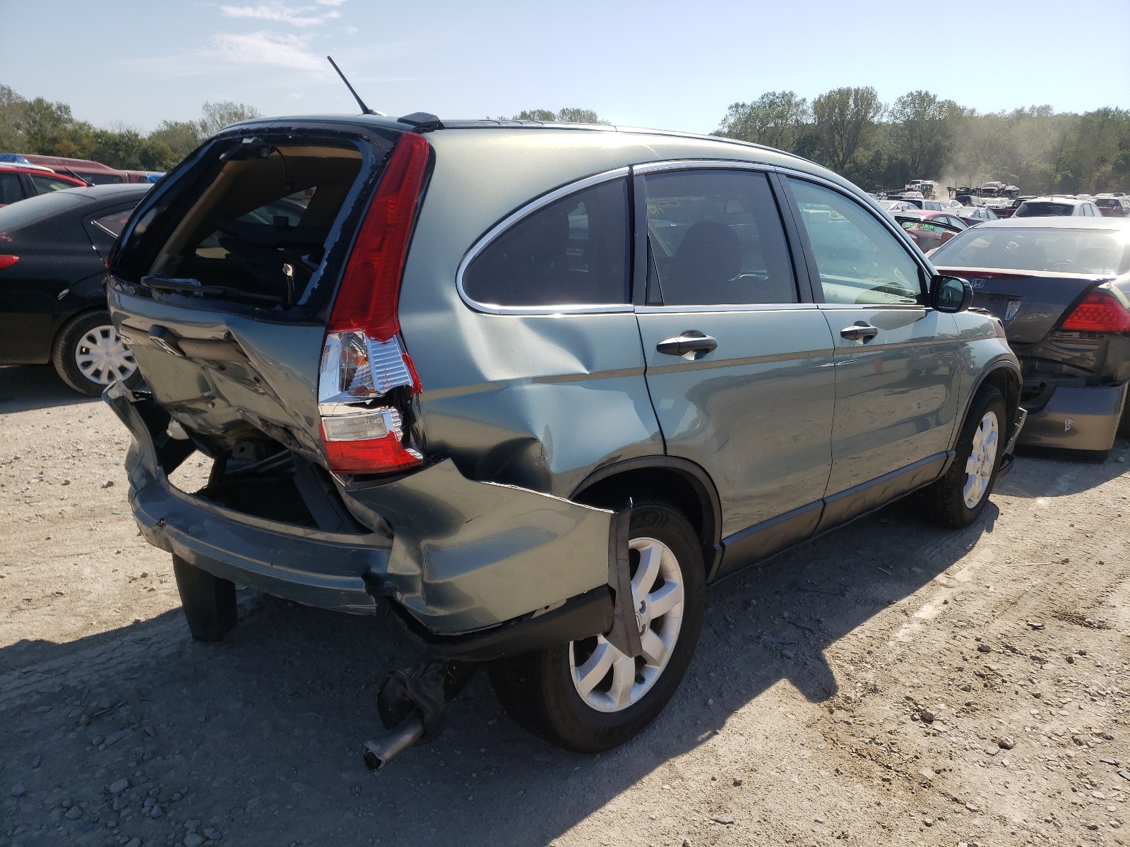 Photo 4 from auction – 2011 HONDA CR-V SE with VIN 5J6RE3H45BL003585