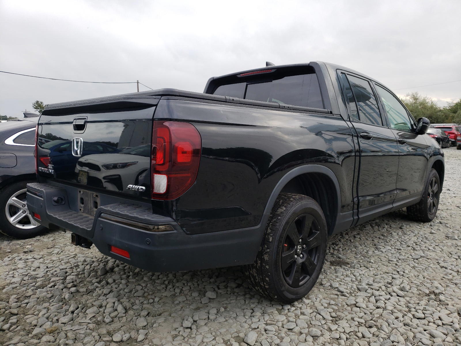 Photo 4 from auction – 2017 HONDA RIDGELINE with VIN 5FPYK3F84HB021482
