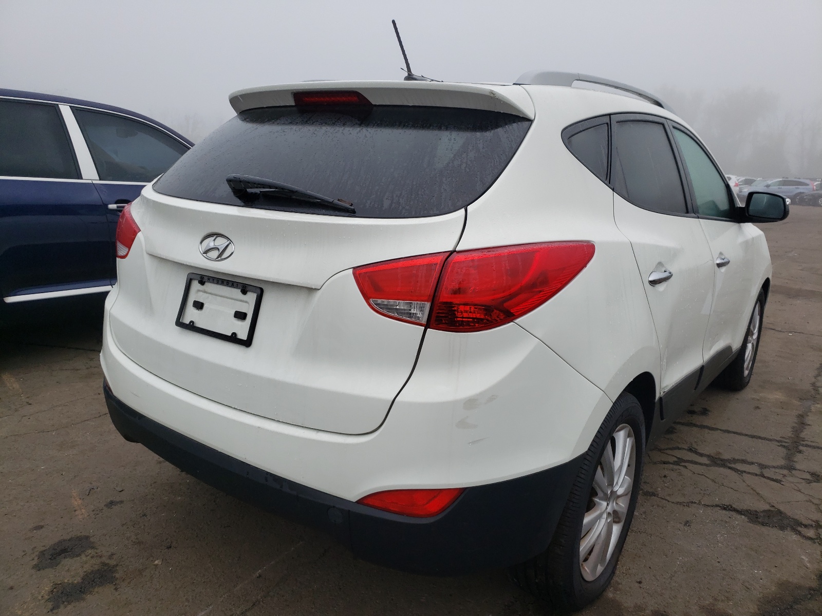 Zdjęcie 4 z aukcji – 2011 HYUNDAI TUCSON z VIN KM8JUCAC0AU023044