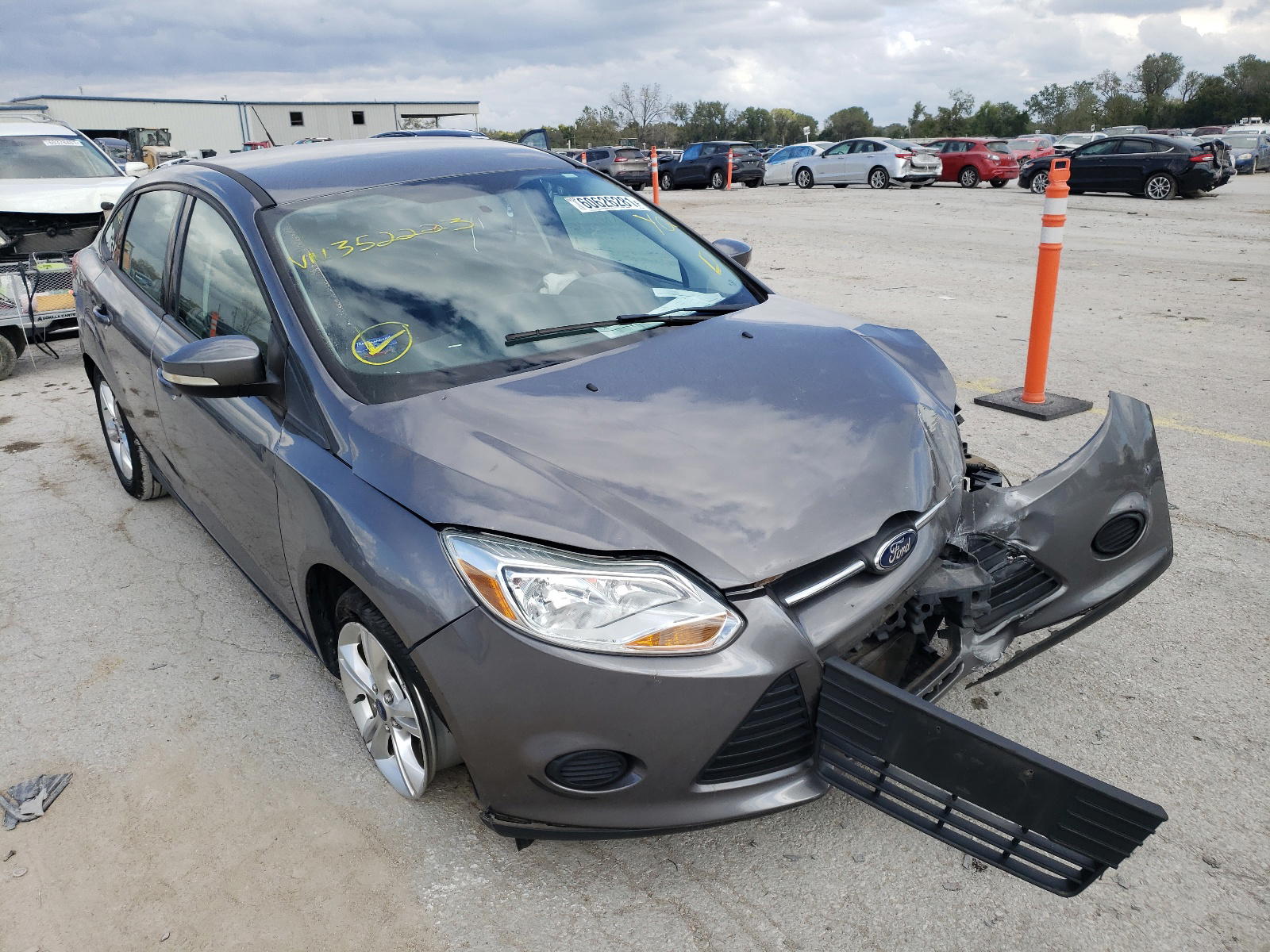 FORD FOCUS SE 2013 with VIN 1FADP3F20DL352223 - Photo from auction