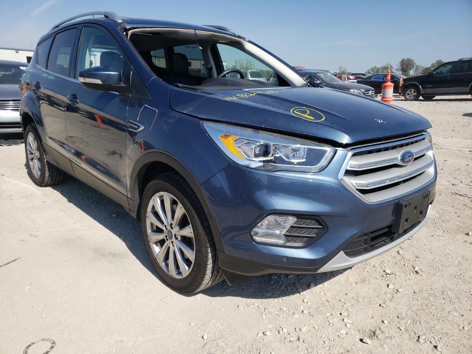 FORD ESCAPE TIT 2018 with VIN 1FMCU9J98JUB02428 - Photo from auction