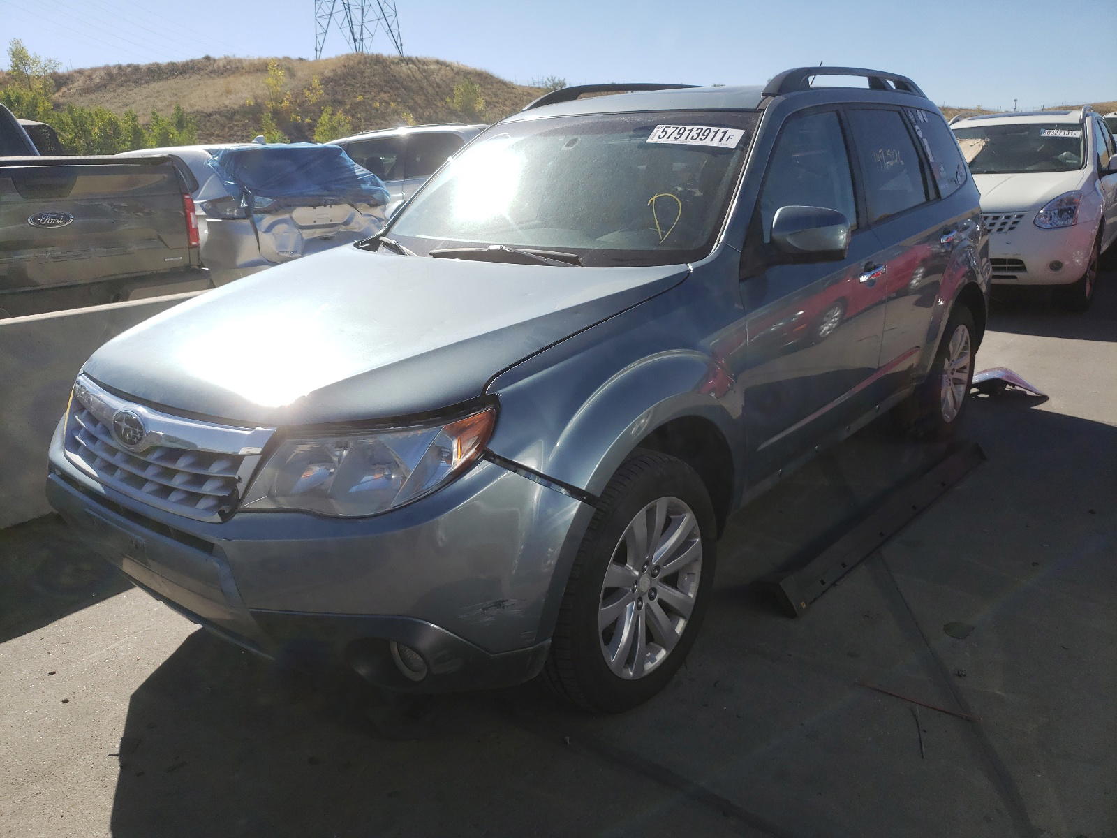 Photo 2 from auction – 2011 SUBARU FORESTER L with VIN JF2SHAEC6BH734576