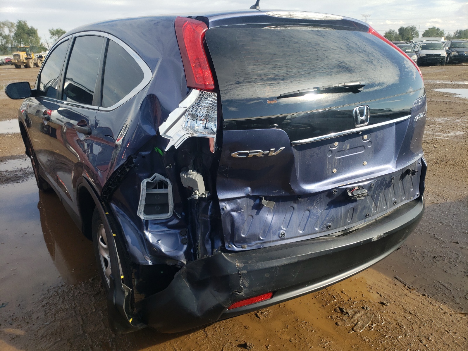Photo 9 from auction – 2014 HONDA CR-V LX with VIN 2HKRM4H36EH696293