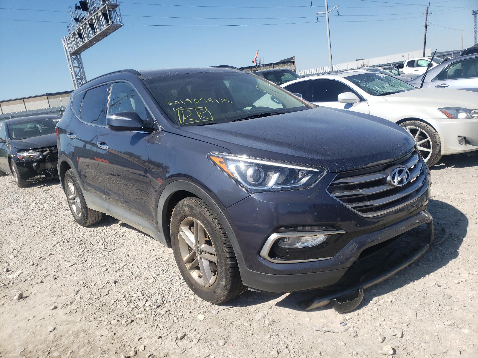 HYUNDAI SANTA FE S 2017 with VIN 5NMZU3LB2HH049917 - Photo from auction