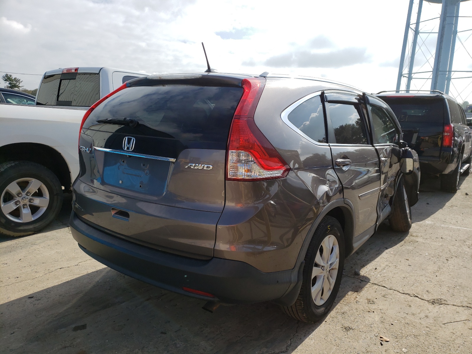 Photo 4 from auction – 2014 HONDA CR-V EXL with VIN 2HKRM4H73EH656272