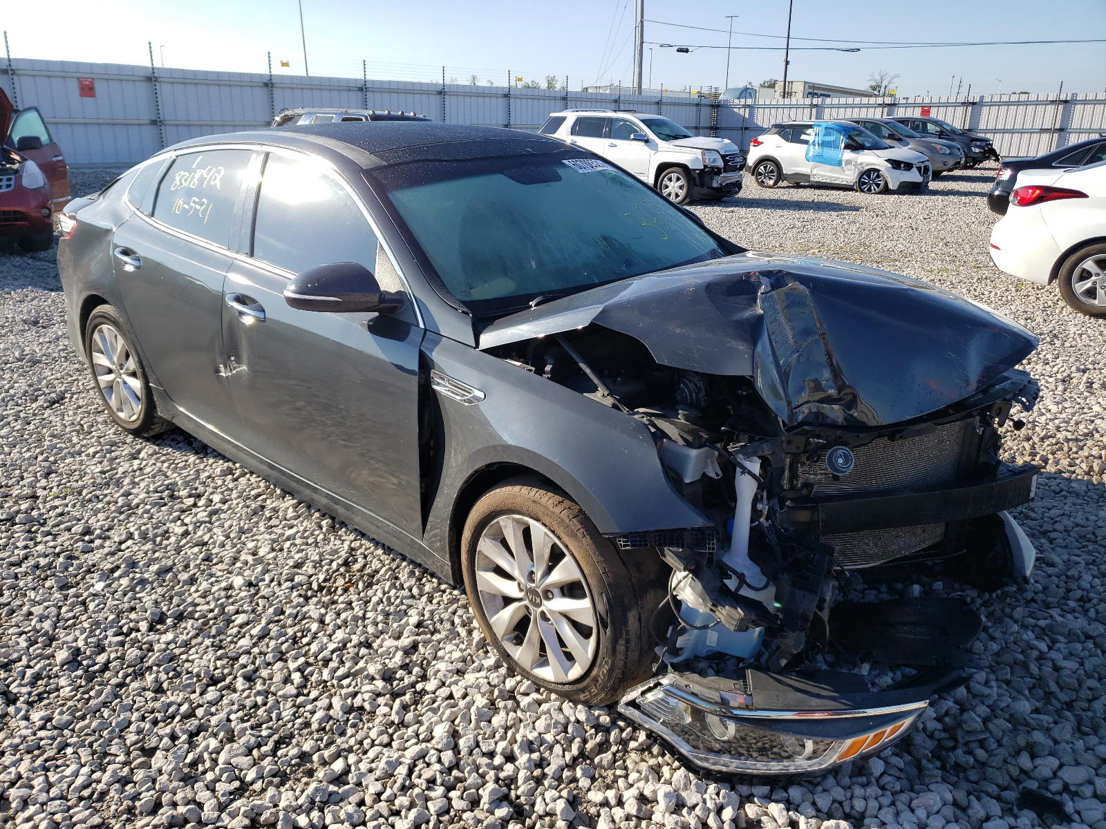 KIA OPTIMA EX 2016 with VIN 5XXGU4L37GG011909 - Photo from auction