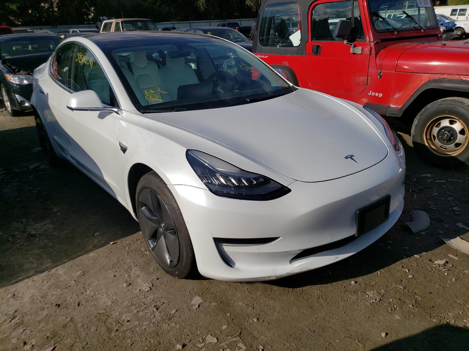 TESLA MODEL 3 2018 with VIN 5YJ3E1EB1JF098151 - Photo from auction