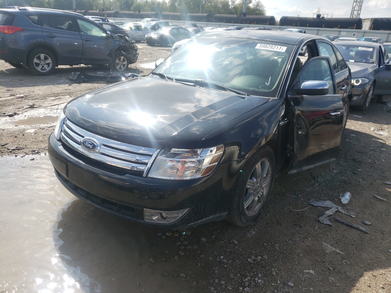 Photo 2 from auction – 2009 FORD TAURUS LIM with VIN 1FAHP25W39G114527