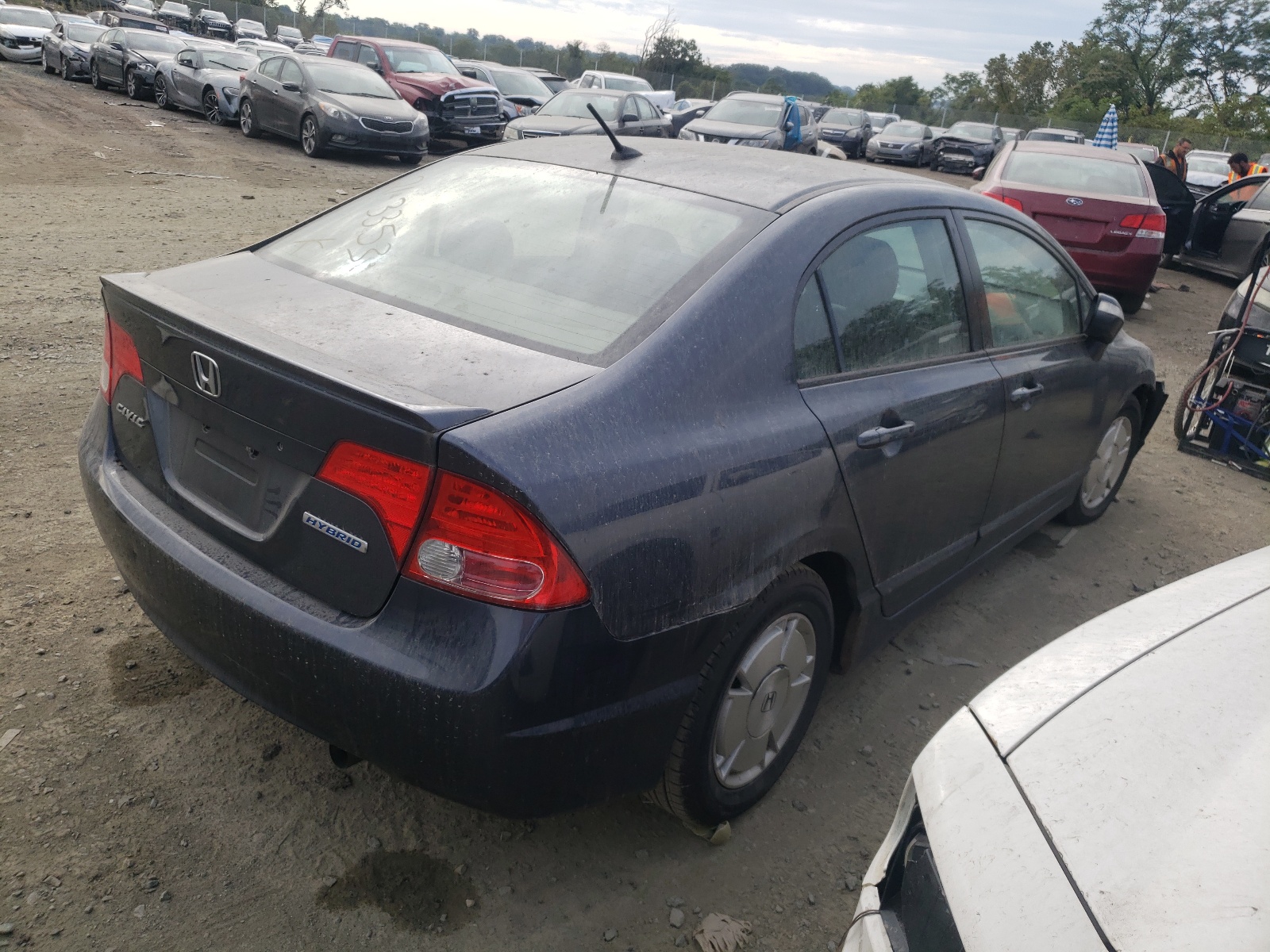 Photo 4 from auction – 2006 HONDA CIVIC HYBR with VIN JHMFA36286S020686