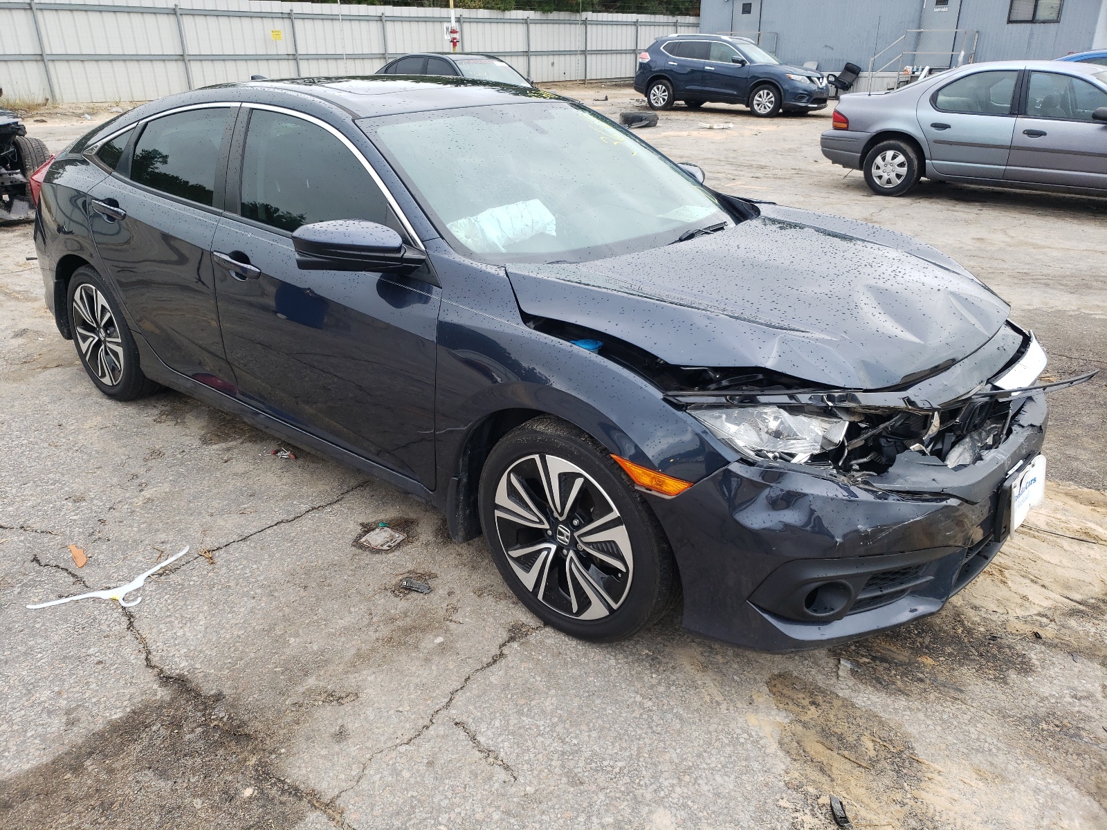HONDA CIVIC EX 2017 with VIN 2HGFC1F31HH631292 - Photo from auction