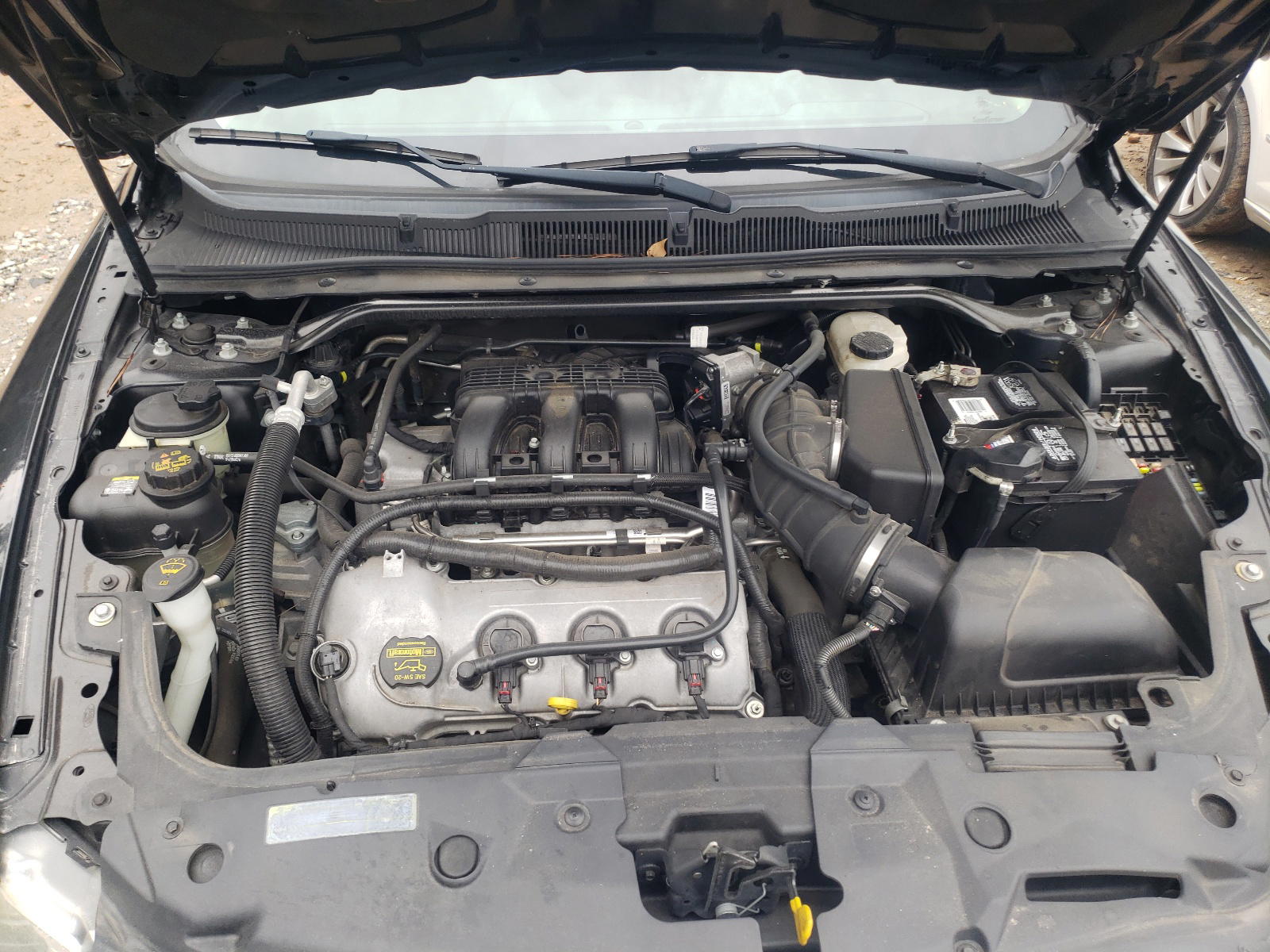 Photo 7 from auction – 2011 FORD TAURUS SE with VIN 1FAHP2DW8BG161236