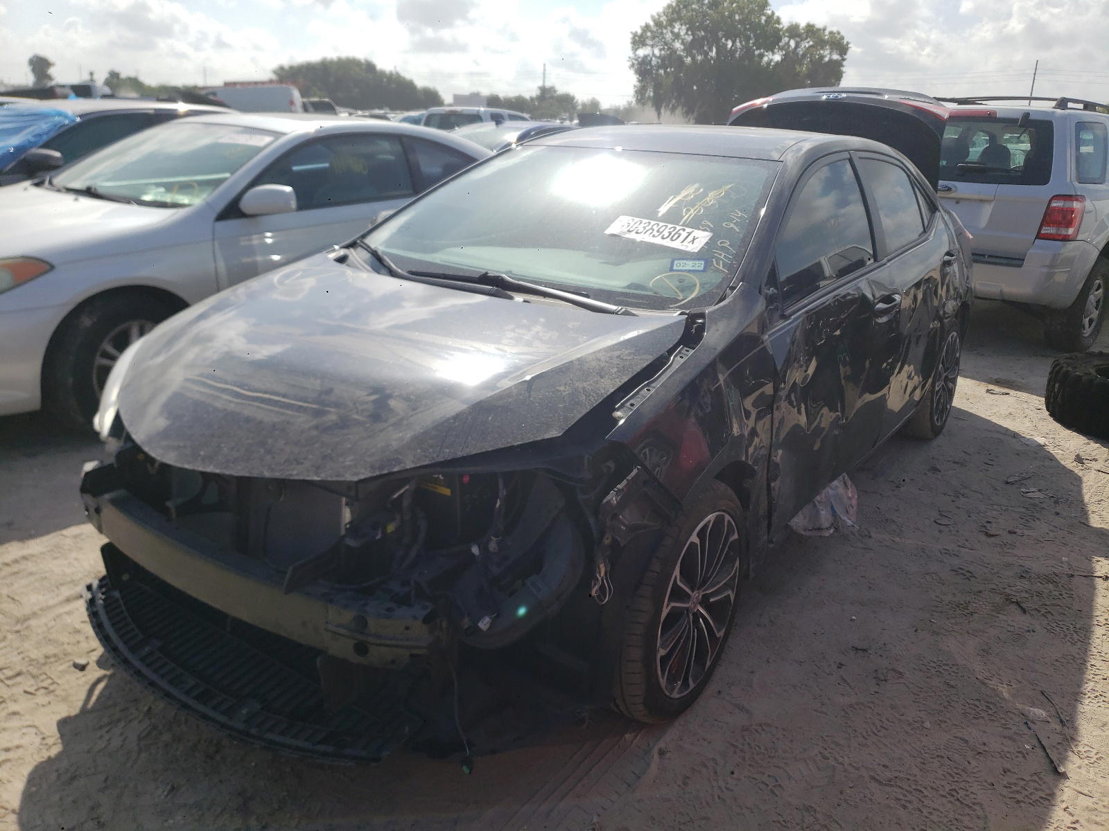 Photo 2 from auction – 2014 TOYOTA COROLLA L with VIN 2T1BURHE2EC194559