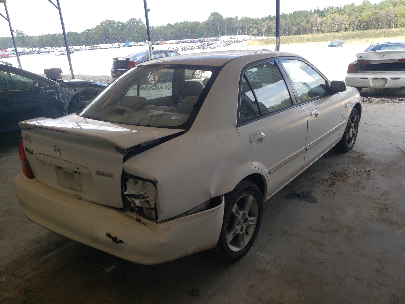 Photo 4 from auction – 2003 MAZDA PROTEGE DX with VIN JM1BJ225X30142127