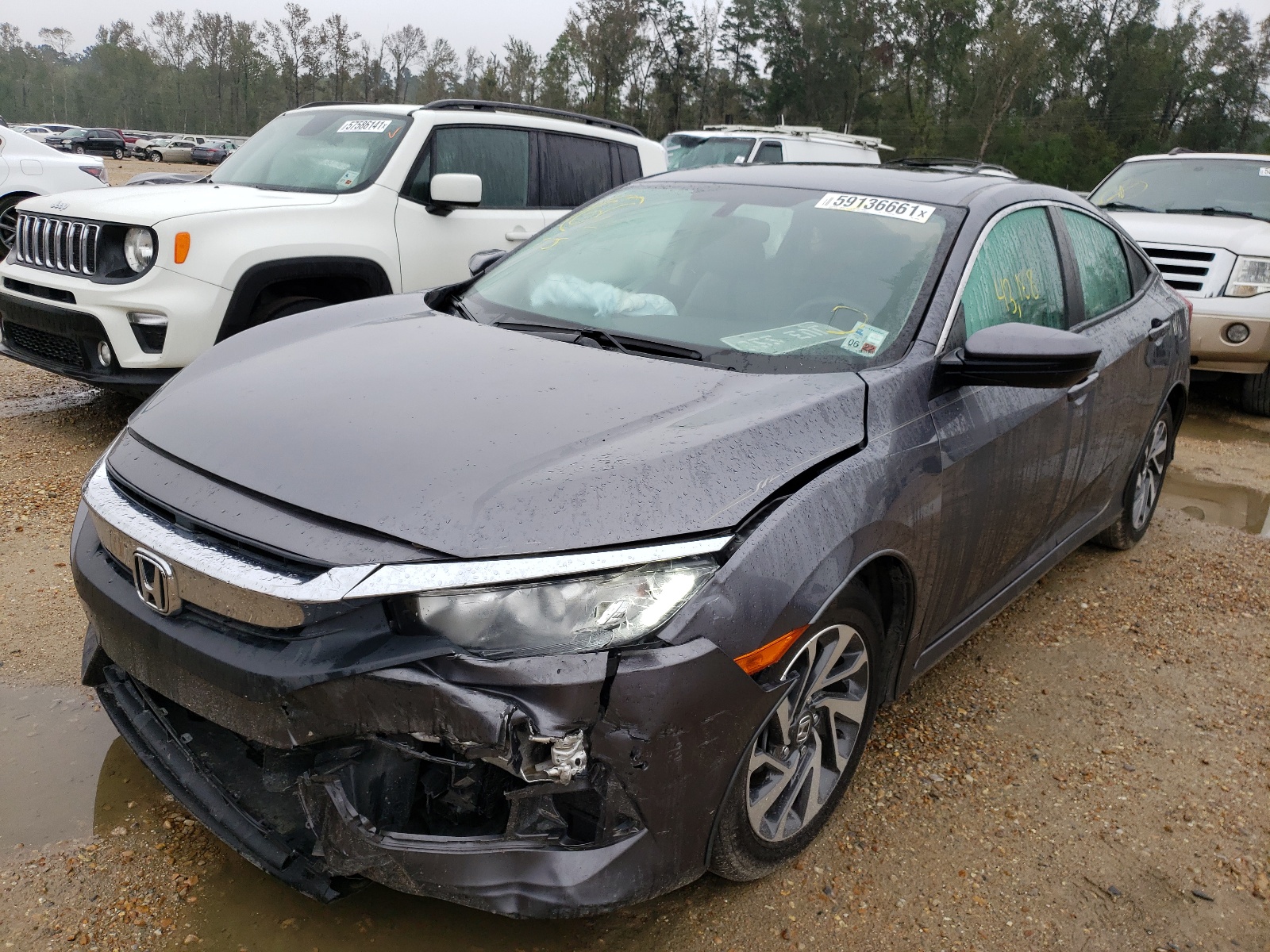 Photo 2 from auction – 2018 HONDA CIVIC EX with VIN 19XFC2F77JE032082
