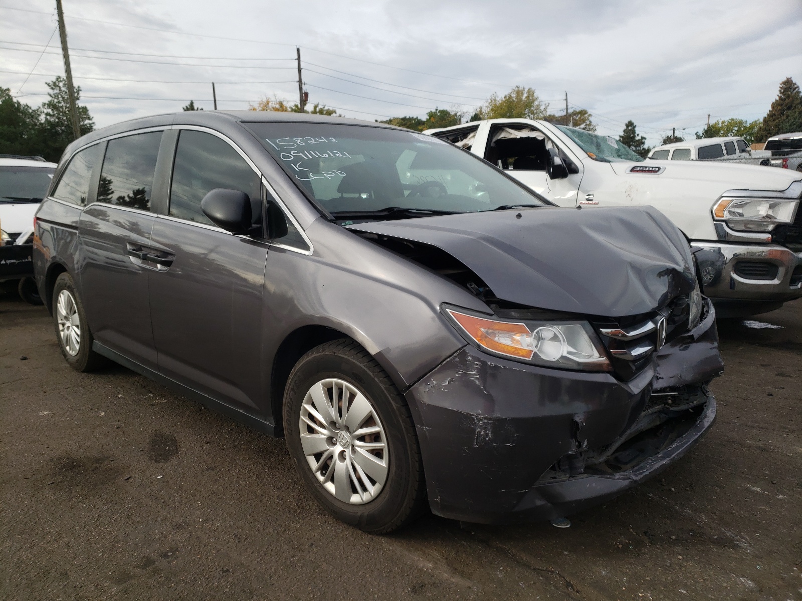 HONDA ODYSSEY LX 2015 with VIN 5FNRL5H25FB062909 - Photo from auction