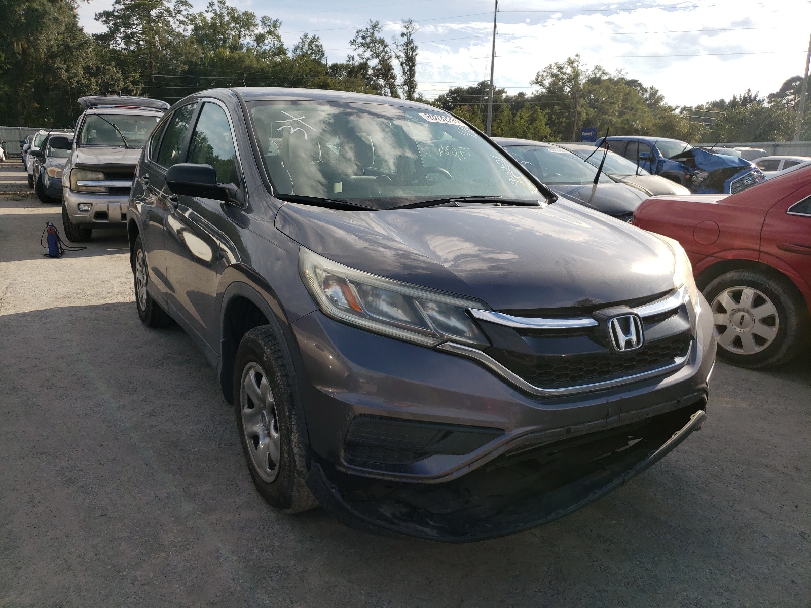 Photo 1 from auction – 2015 HONDA CR-V LX with VIN 3CZRM3H30FG704340