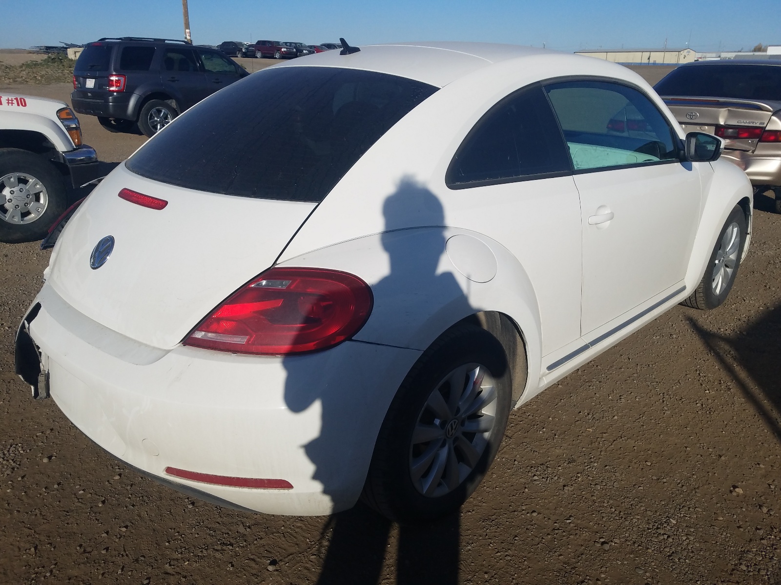 Photo 4 from auction – 2012 VOLKSWAGEN BEETLE with VIN 3VWHX7AT6CM619734