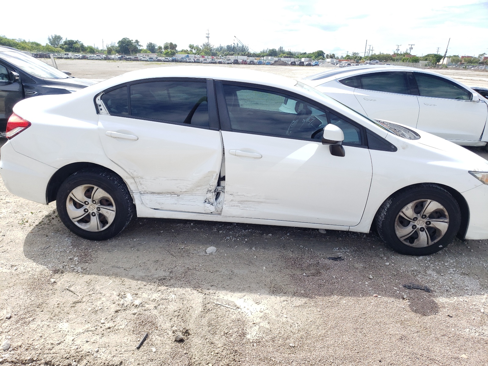 Photo 9 from auction – 2013 HONDA CIVIC LX with VIN 19XFB2F51DE093093