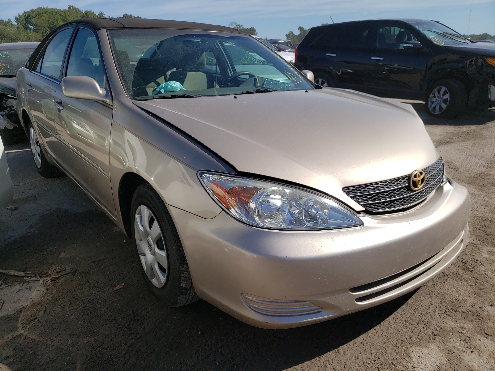 TOYOTA CAMRY LE 2002 with VIN 4T1BE32K72U070824 - Photo from auction