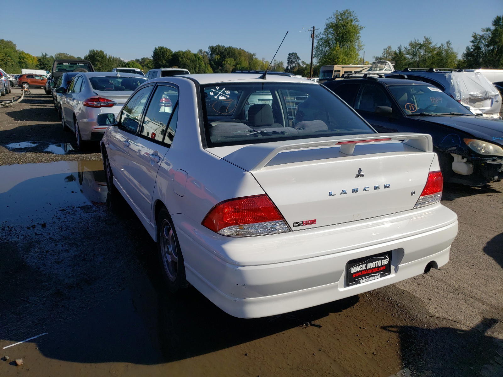 Photo 3 from auction – 2002 MITSUBISHI LANCER OZ with VIN JA3AJ86E02U059109